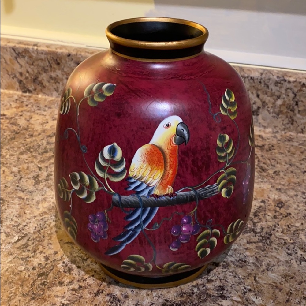 Red decorative vase with bird print